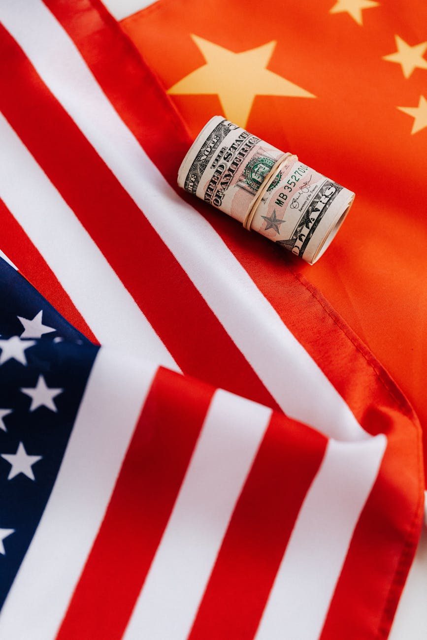 bright american flag with roll of greenbacks